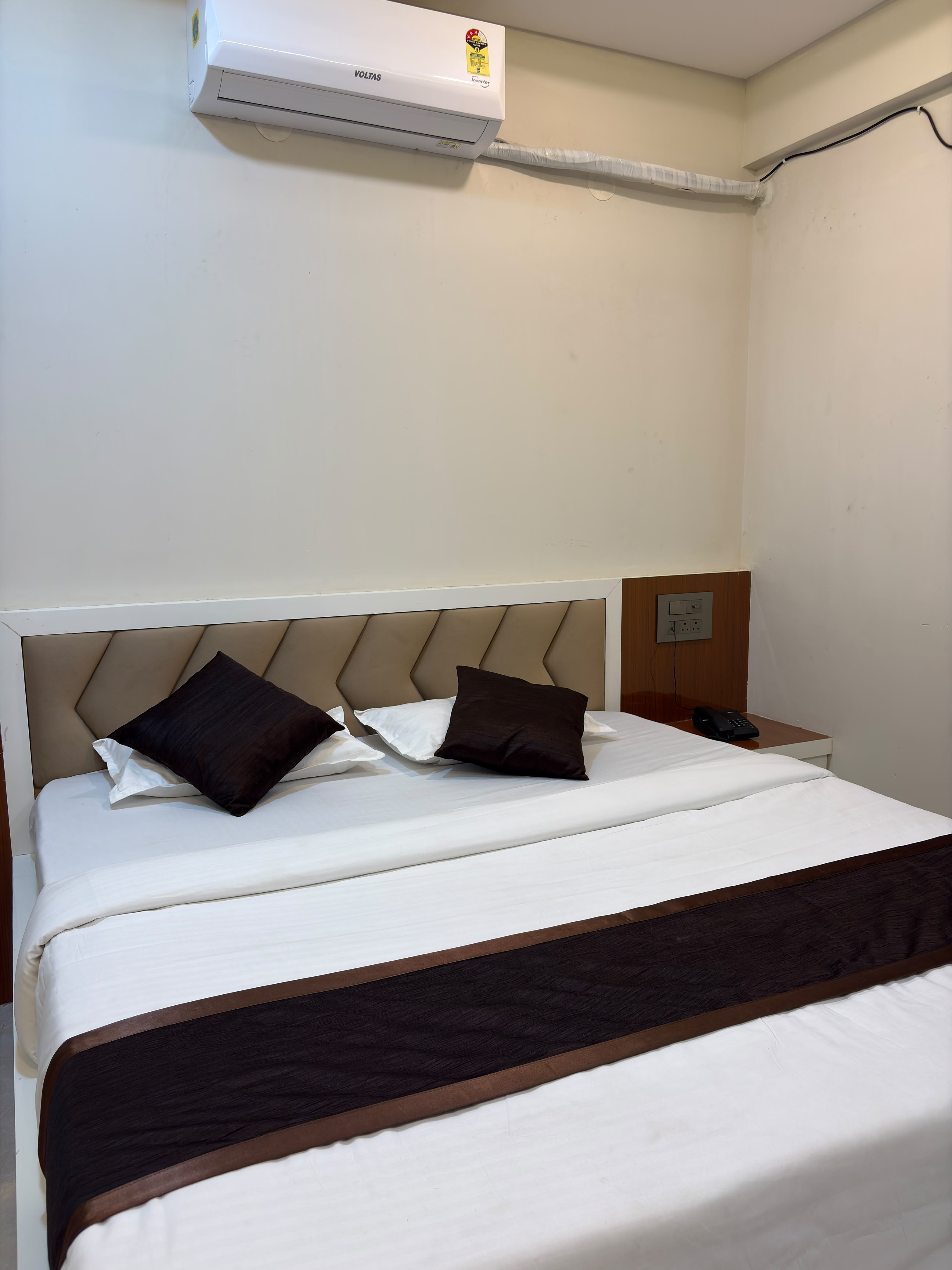Comfortable guest room at Hotel Royal Inn Regency